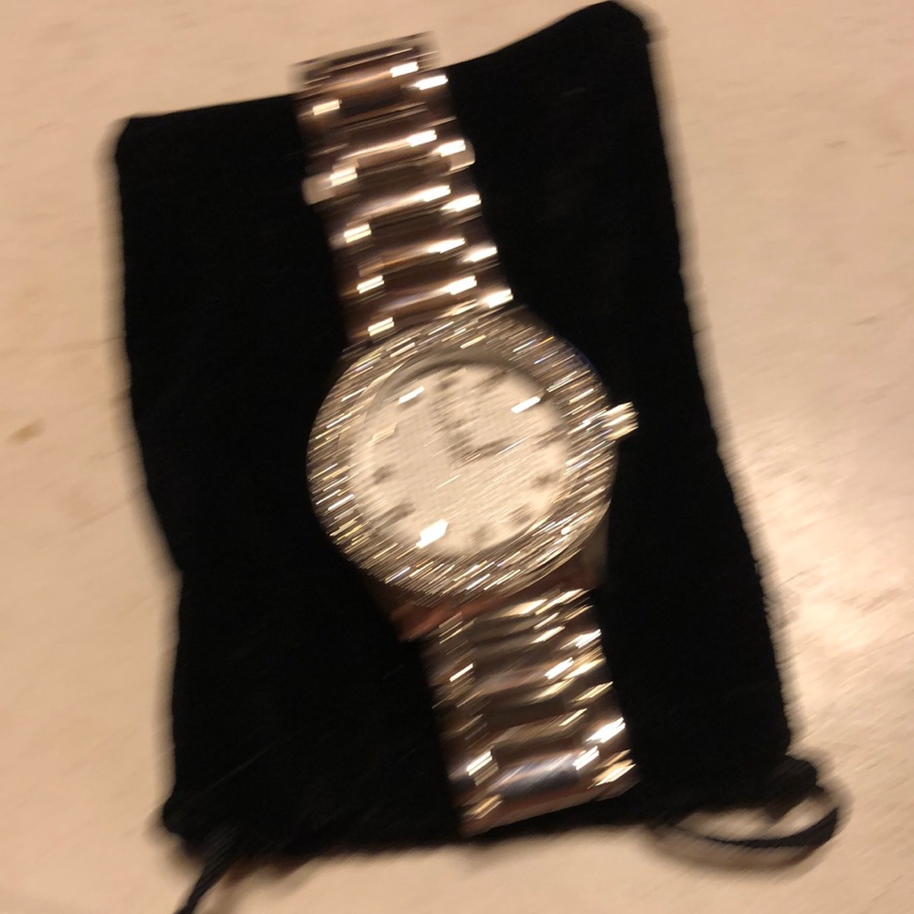 IXE men’s stainless steel quartz watch